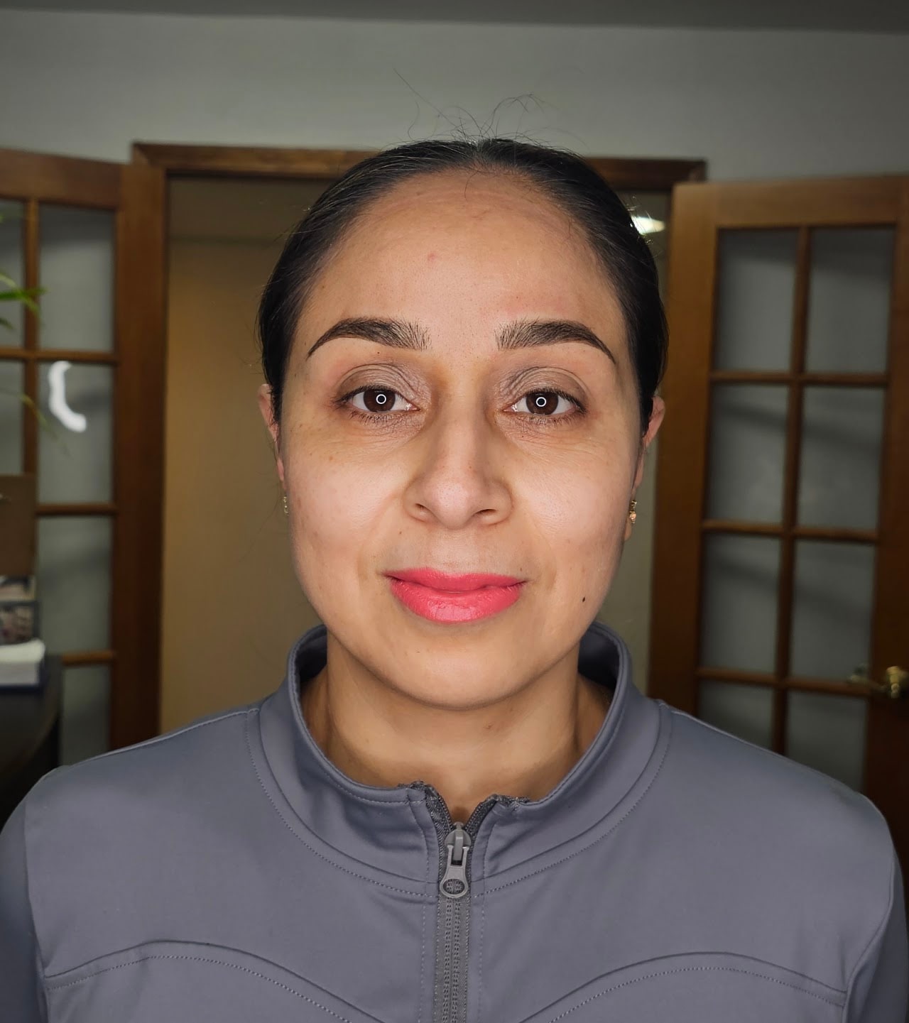 Rio PMU Studio client portrait showing a fresh defined brow result
